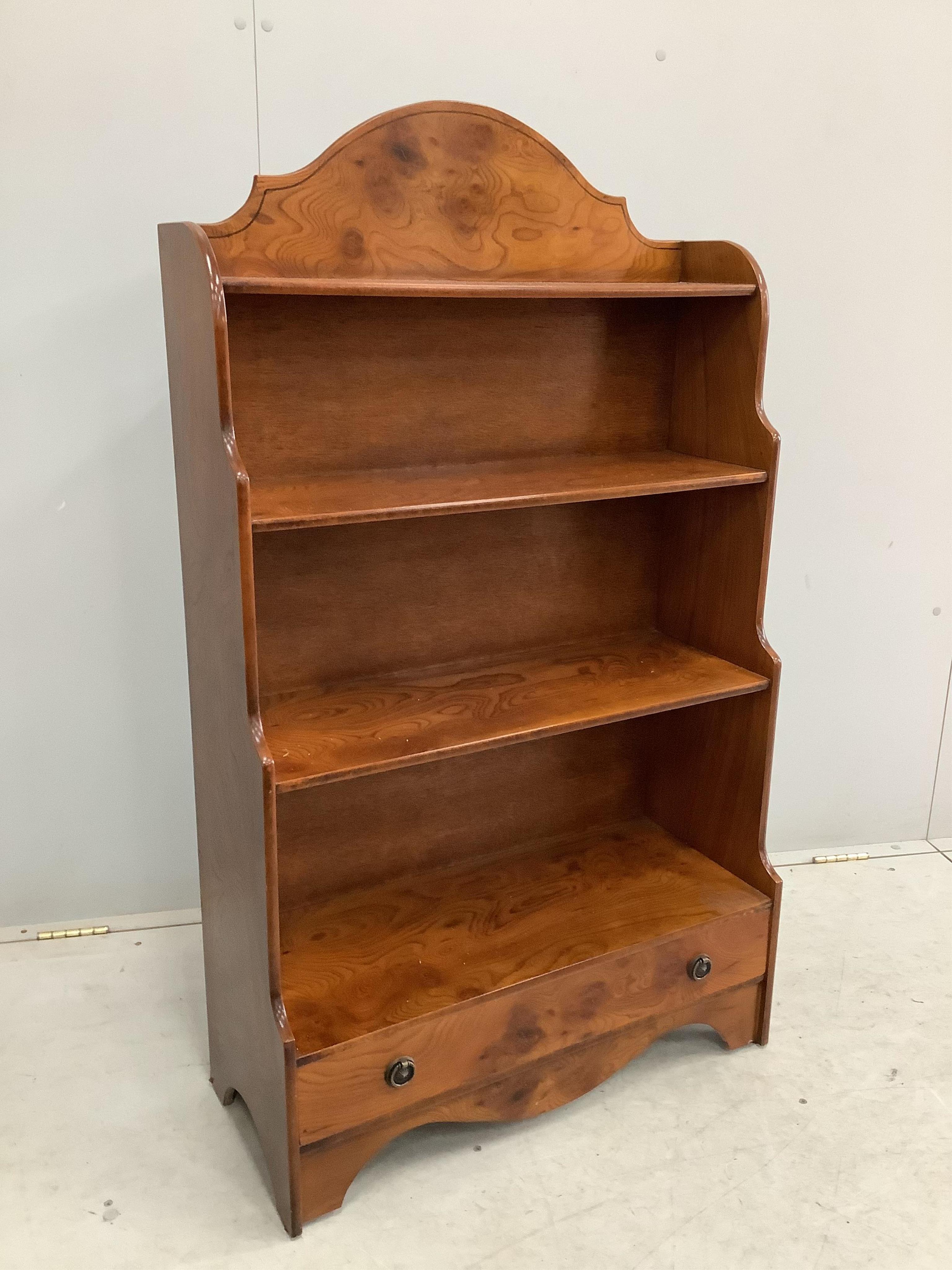 A reproduction elm graduated open bookcase, width 70cm, height 121cm. Condition - fair to good